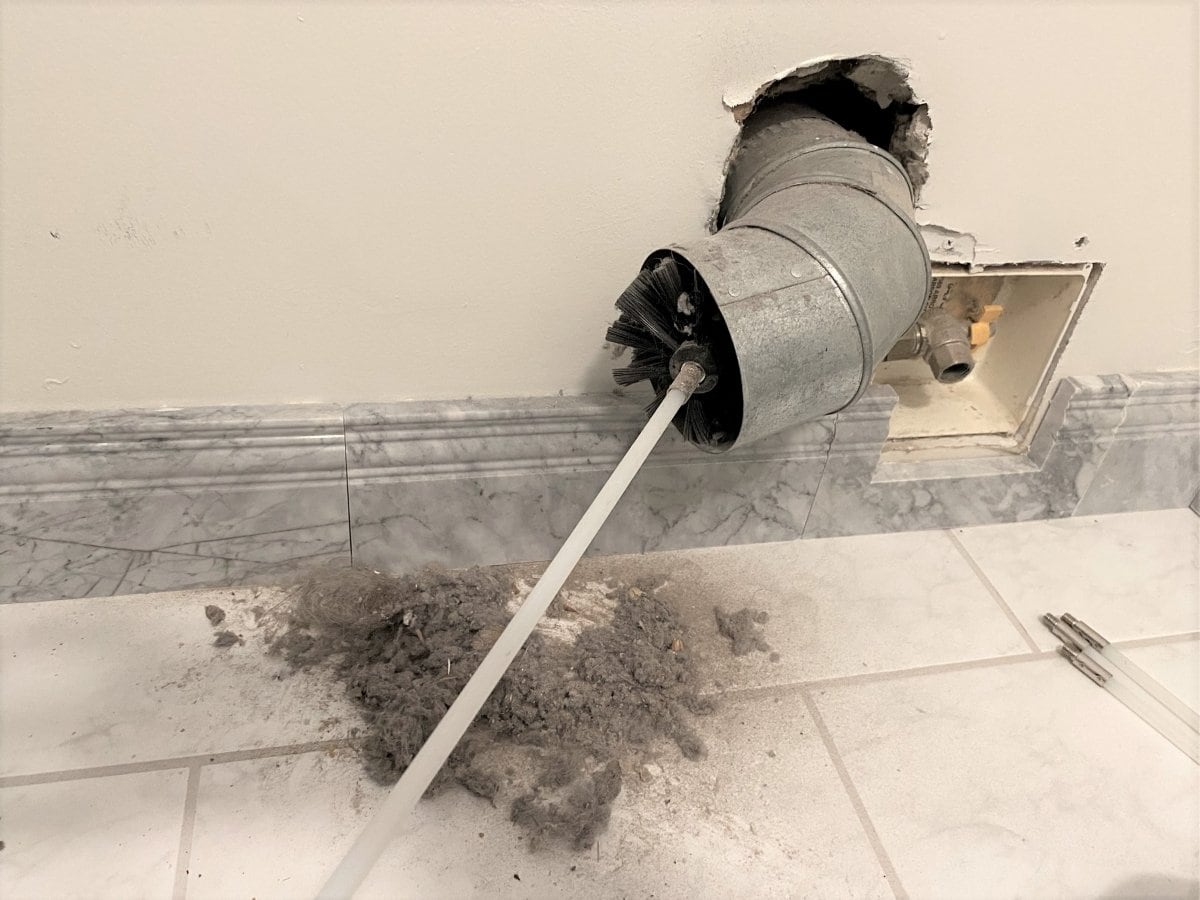 Dryer vent cleaning technician